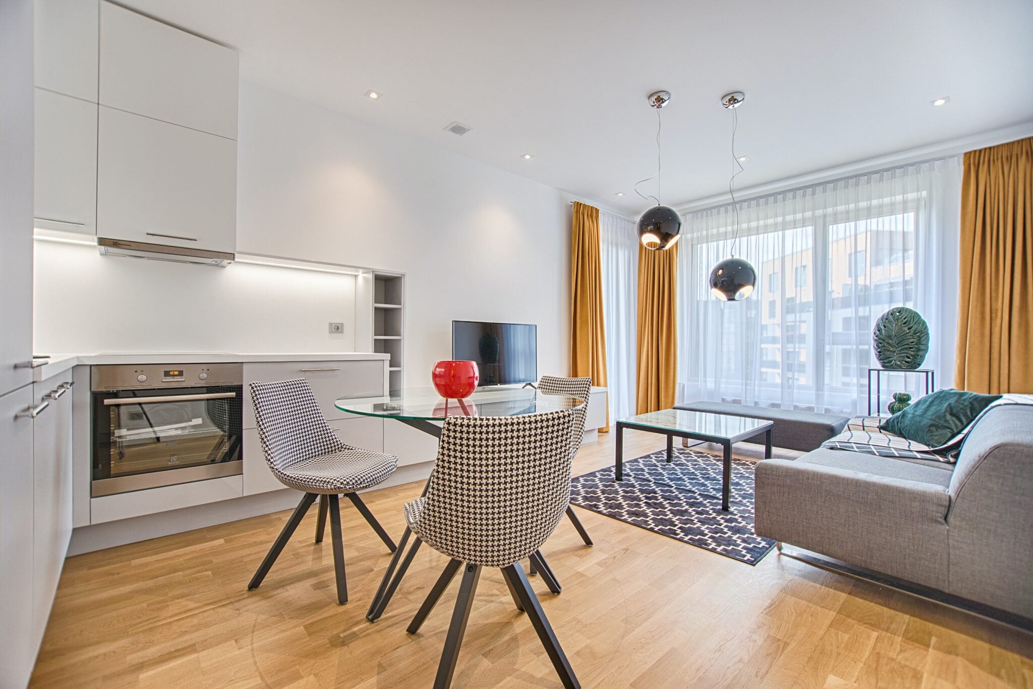 living-room-with-sofa-chairs-table-tv